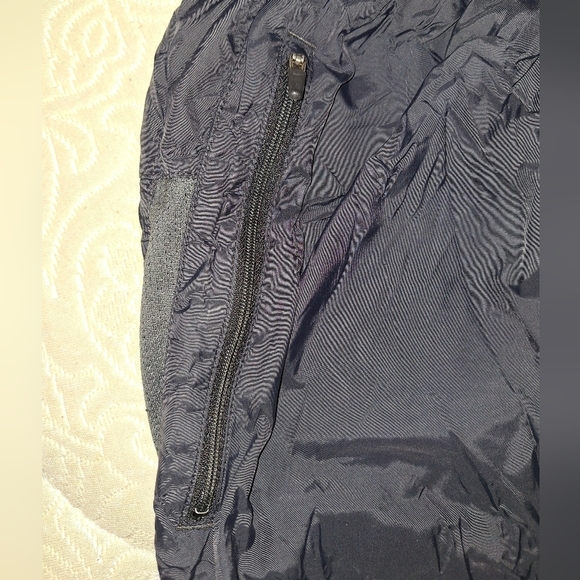 A pair of Nike nylon lounge pants. They're pre-loved and in great condition - Picture 2 of 6